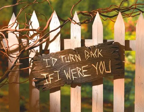 Like magic, a sign reads 'I'd Turn Back If I Were You'. A warning that spoilers for The Once and Future Witches by Alix E Harlow are coming.